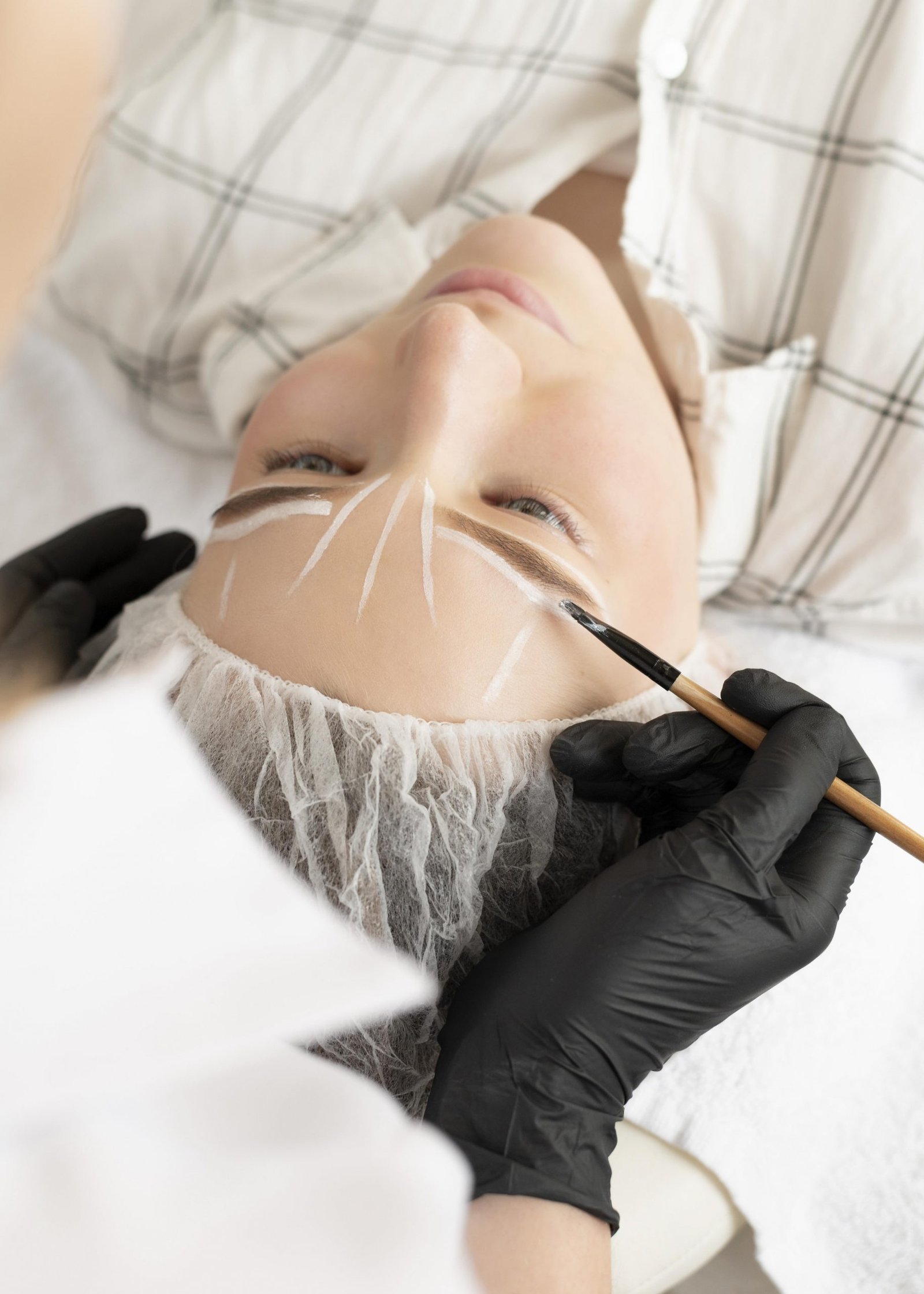 woman-getting-eyebrow-treatment